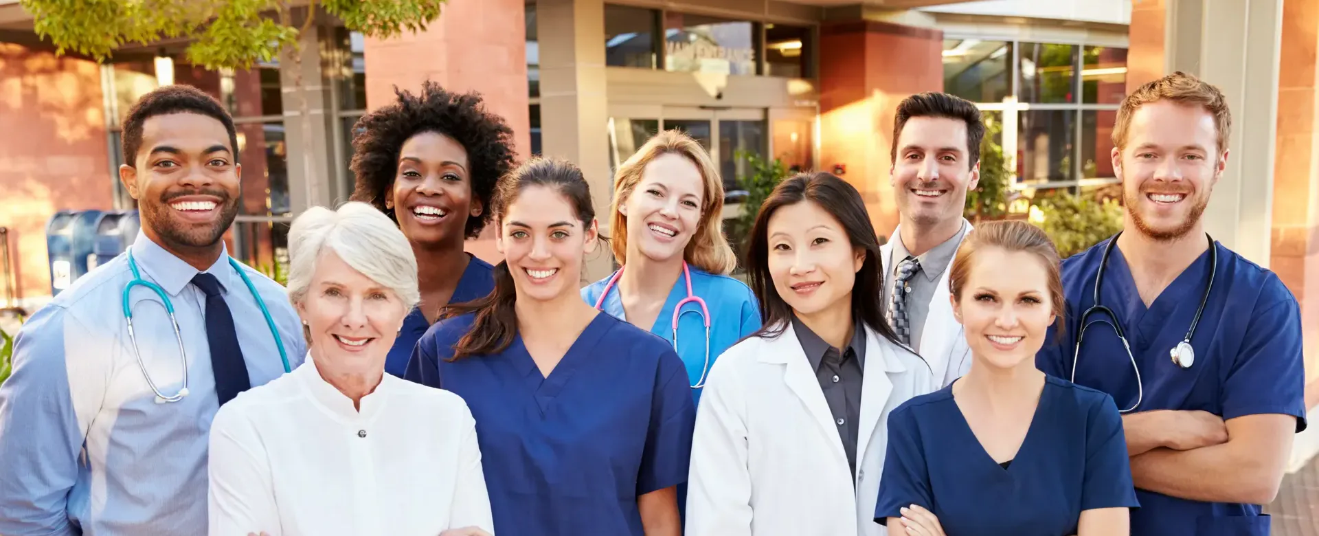 Clinical research staff outside a medical center
